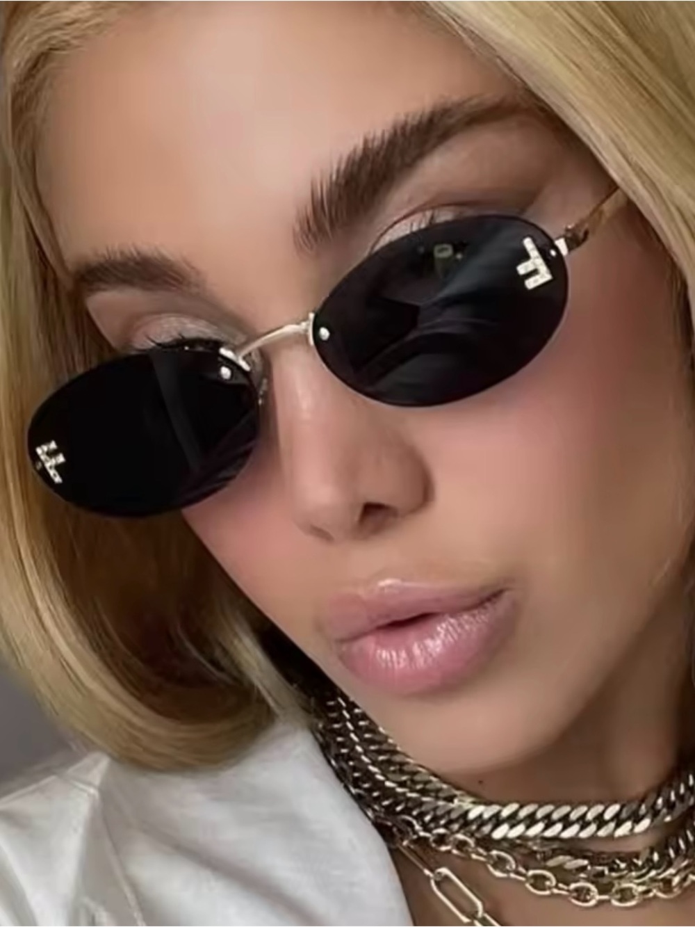 Black Rimless Oval Sunglasses – Women Accessories